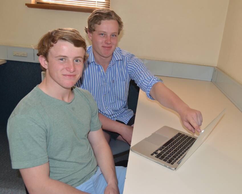 Kinross Wolaroi School year 12 boarding students Sam Eberle and Ross Alston studied chemistry during the study camp on Thursday afternoon. Photo: TANYA MARSCHKE 