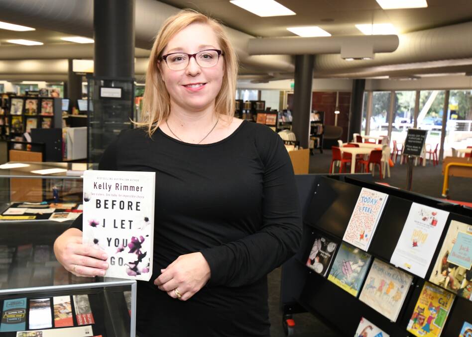 ADDICTIVE PAGE TURNER: Orange author Kelly Rimmer is excited to launch her first print released book in Australia, Before I let you go. Photo: JUDE KEOGH0220 jkrimmer1