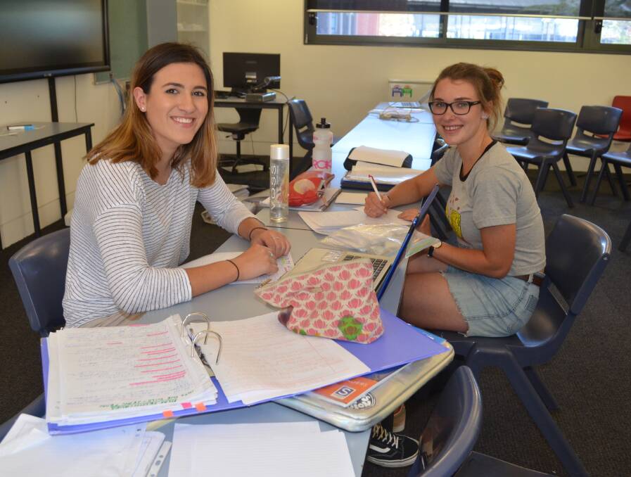 STUDY TIME: Year 12 students Fran Casti from Sydney and Chloe Wilson from Grenfell returned to Kinross Wolaroi School for a study camp. Photo: TANYA MARSCHKE 