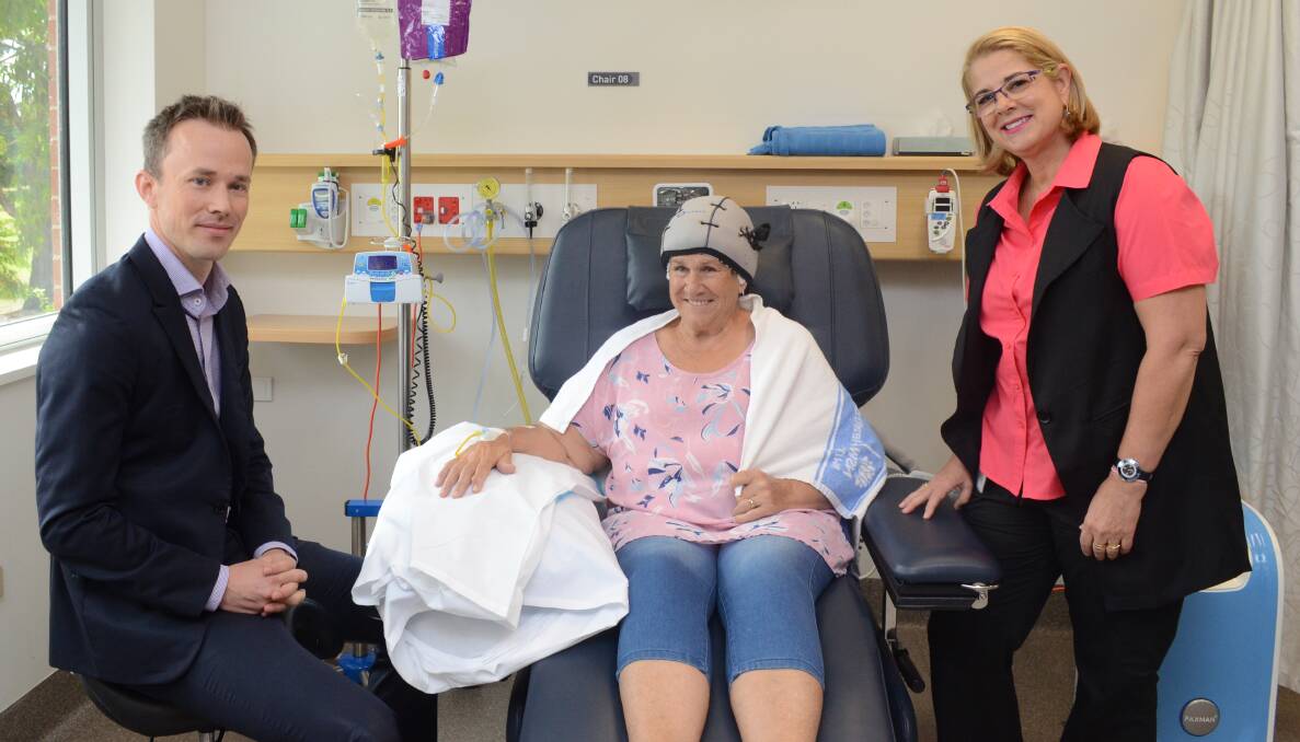 HAIR SAVING TRIAL: Medical oncologist for Orange and Bathurst Dr Peter Fox, cold cap trial participant Ellen Davies and McGrath Breast Care nurse for Orange and Cabonne Sue Kuter are trialling a technology that could reduce hair loss during chemotherapy treatment. Photo: TANYA MARSCHKE