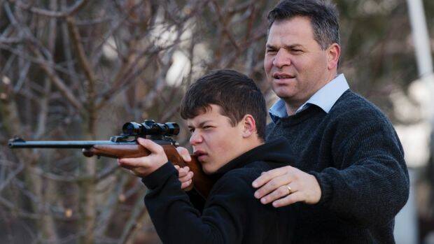 Shooters, Fishers and Farmers Party member, Phil Donato with 13-year-old son Sean on their property outside Orange. Photo: James Brickwood