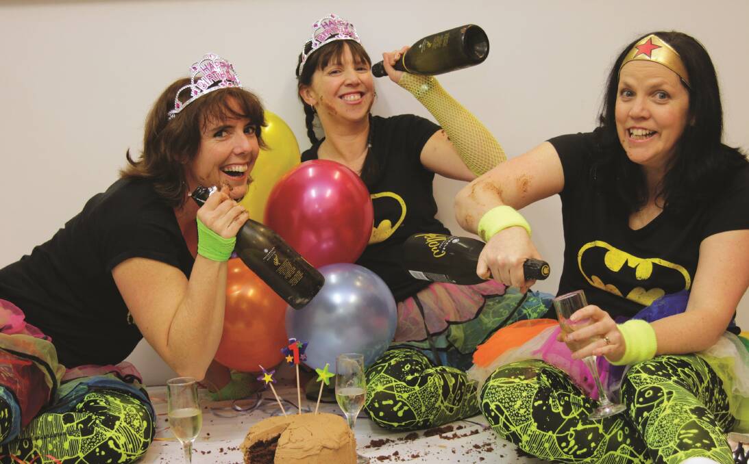 A SUPER FUNDRAISER: Zumba party fundraiser organisers Rachel Crawford, Belinda Riley and Penny Flannery get ready to celebrate in superhero style at Calare Public School Hall. PHOTO: Contributed