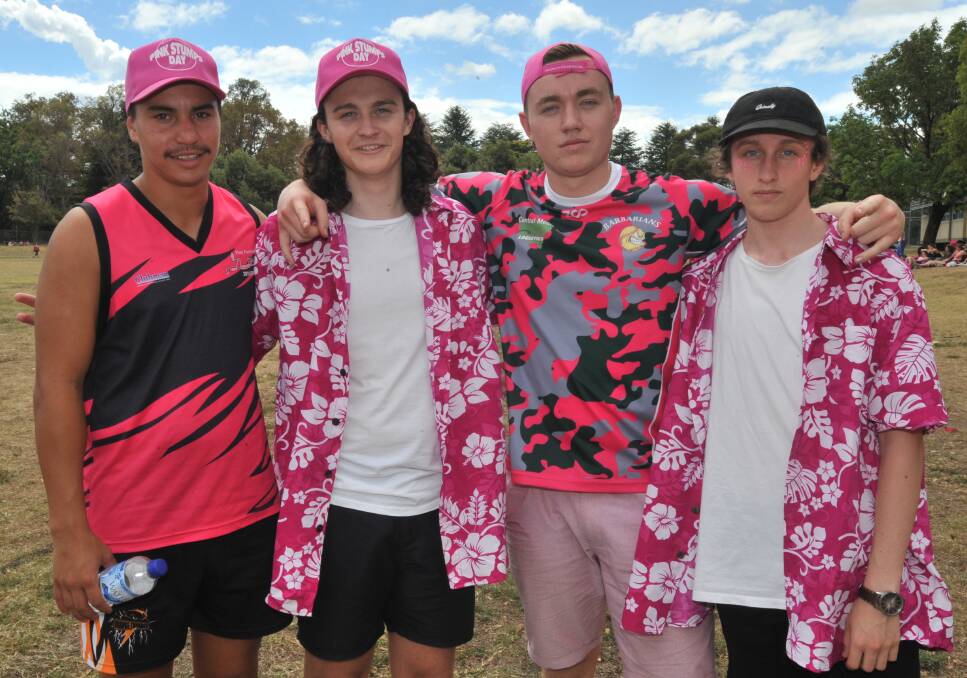REAL MEN WEAR PINK: Mitch Leonard, Luke Roninson, Tristan Degn and James Bradford donned pink for breast cancer research. 0301jkpink6