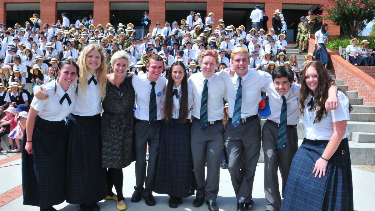 KEEN FUNDRAISER: Former Kinross Wolaroi School student Alasdair Denholm (second from the right) with Nicola Kermode, Mia Hull, Emma Jackson-LeCouteur, Harry Lovell, Emily Wright, Charlie Cooper, Ben Watt and Maddie Adams at the World's Greatest Shave in 2014. Photo: JUDE KEOGH