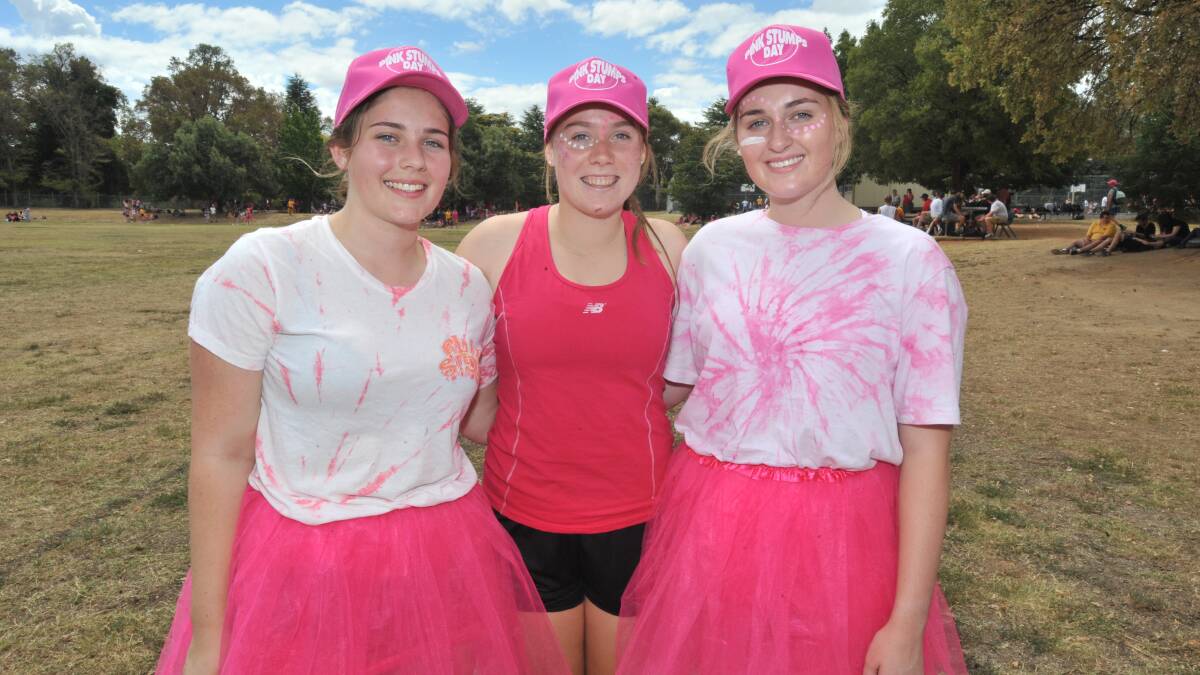 TICKLED PINK: Phoebe Carden, Lucy Cooper and Paris Easey were glad to support the cause with pink tutus and hats. 0301jkpink5