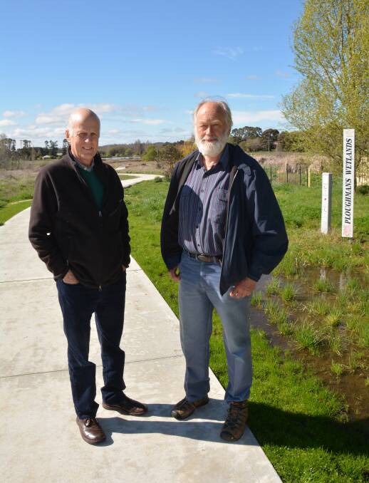 PROMOTING SUSTAINABILITY: Former ECCO president Neil Jones and current ECCO president Nick King at Ploughman's Valley Wetlands. PHOTO: ZENIO LAPKA