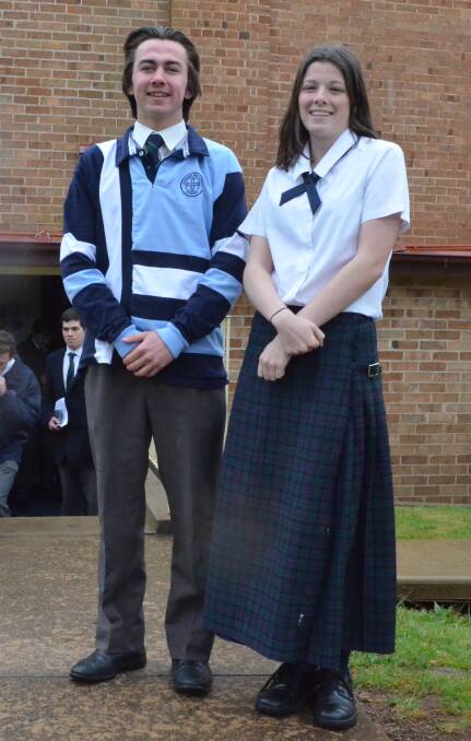 PENS DOWN: Kinross Wolaroi School students Louis Carr and Rebecca Atkins after they completed the senior science exam on Monday. Photo: EMILY BENNETT