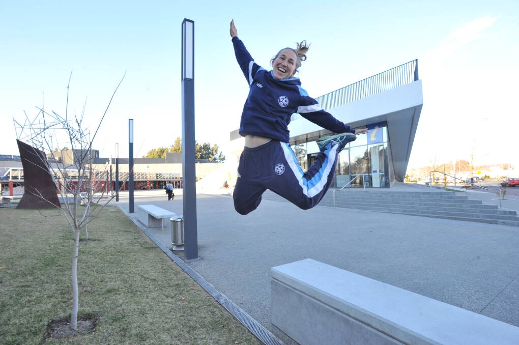 JUMP FOR JOY: Kinross Wolaroi School physical education teacher Claire Goodall feels enthusiastic about supporting the Cancer Council through the Stars of Orange Dance for Cancer event on Saturday. Photo: JUDE KEOGH