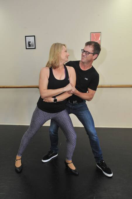 READY TO GO: Robyn and Murray Evans practice their routine for Stars of Orange Dance for Cancer at Central West Performing Arts studio. Photo: JUDE KEOGH 