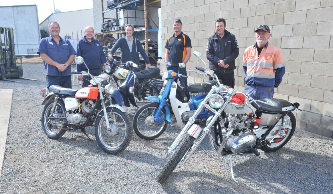 ON THE ROAD: Steve Doherty, Steve Kay, Lee Gilmour, Paul Jones, Aaron Goerss and Howard Monkrud prepare for the Ride Blue Little Day Out. Photo: JUDE KEOGH 0503jkride1