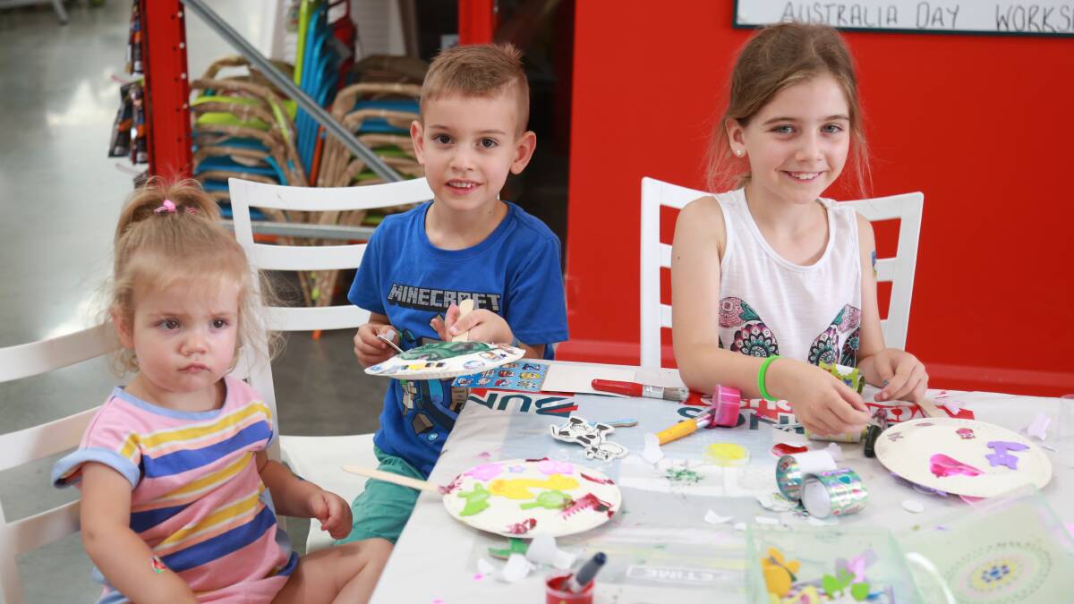 Willa, Alex and Claire Pansini had family day out at a painting workshop. Photo: PHIL BLATCH