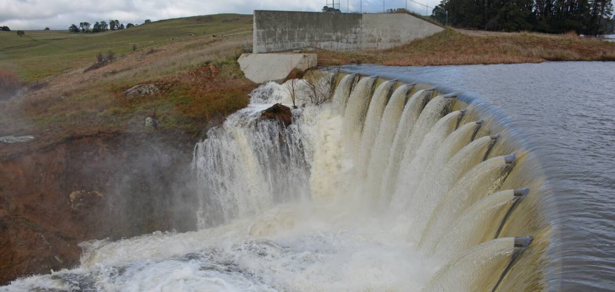 OVERFLOW:  Water is cascading over the dam wall at Spring Creek dam after this week’s heavy rainfall: Photo contributed.