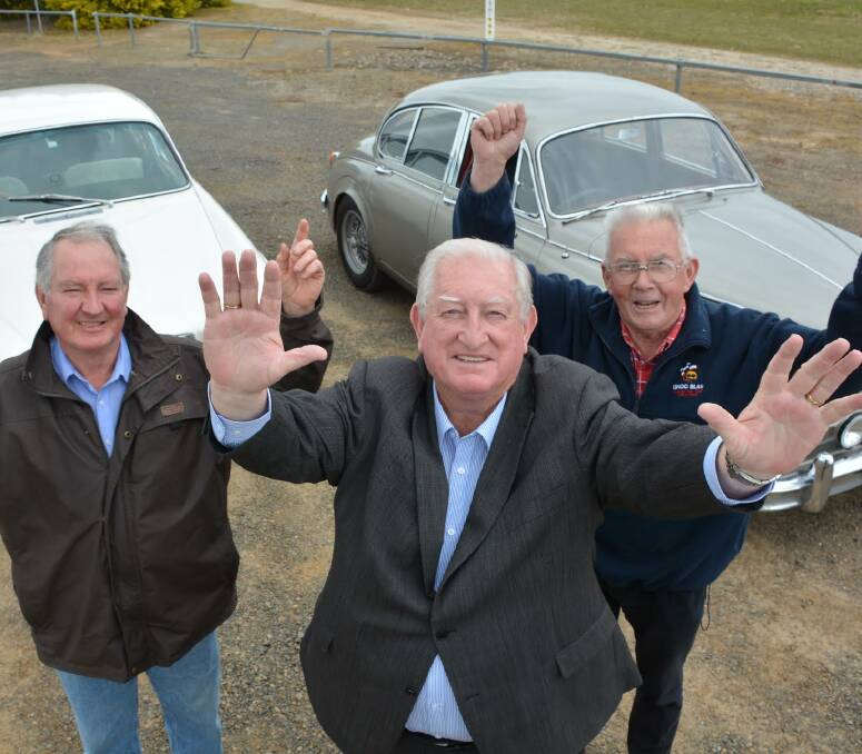 CLASSIC CARS: Orange mayor John Davis flanked by Jaguar owners Graham Barrett and Gwyn Mulholland getting ready to showcase their vehicles this weekend.