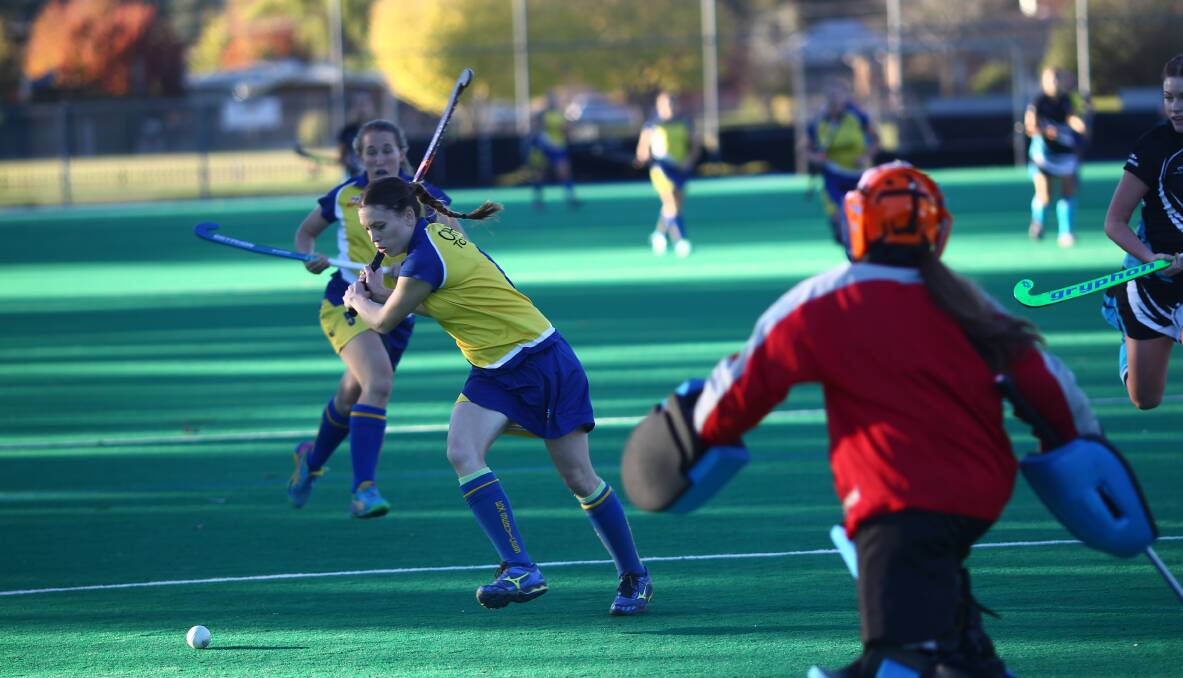 IN FORM: Ex-Services will look to the likes of Shian Duboc to break through Bathurst City's  defensive wall. Photo: PHIL BLATCH 0514pbhockey6