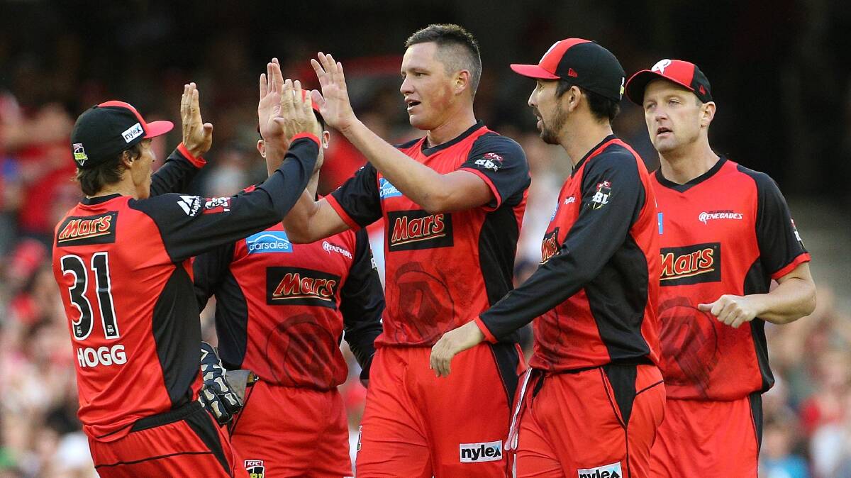 WELCOME BACK: Chris Tremain celebrates taking the wicket of Jake Weatheral in his first BBL appearance of the summer. Photo: AAP/HAMISH BLAIR