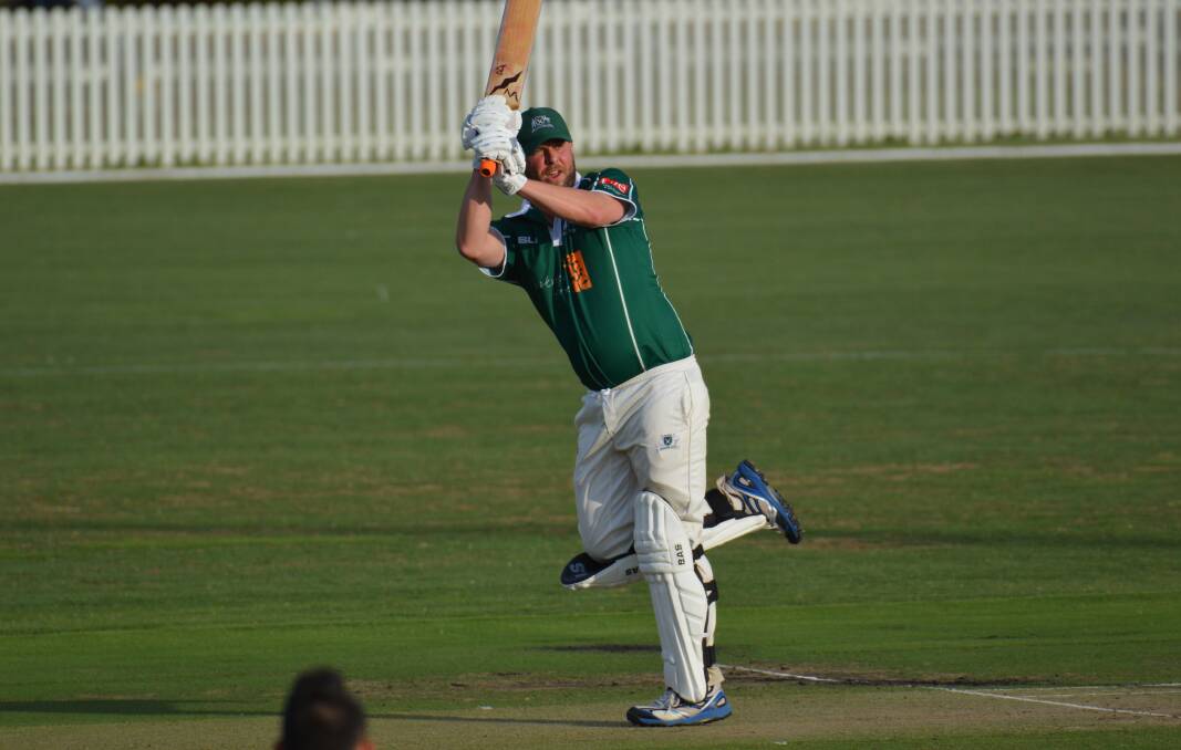 GOING BIG: Nathan Rosser, wielding Wonderbat, smashes one over midwicket in a Royal Hotel Cup clash. He'll try and go big for Orange on Sunday. Photo: MATT FINDLAY