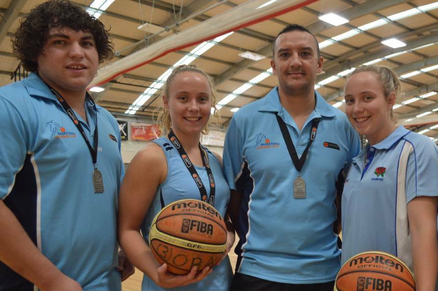 GREAT FINISH: Keelan Crawford and Dean Pallier, pictured with Eliza and Bernadette Mills, helped their NSW team to fifth. Photo: MATT FINDLAY
