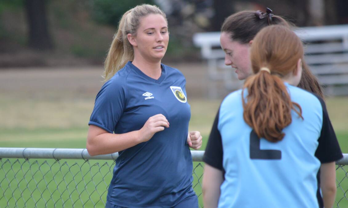 POSITIVE SIGNS: Western star Jasmin Courtenay works through pre-season training, which she says has been positive. Her side opens its NPL2 campaign on Saturday. Photo: MATT FINDLAY