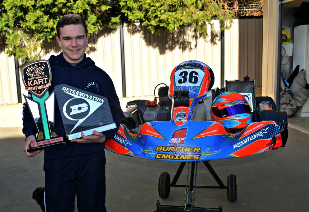 SPEED TO BURN: Cody Burcher shows off his spoils from the Australian Kart Championship, he secured his maiden podium finish in 2017. Photo: MATT FINDLAY