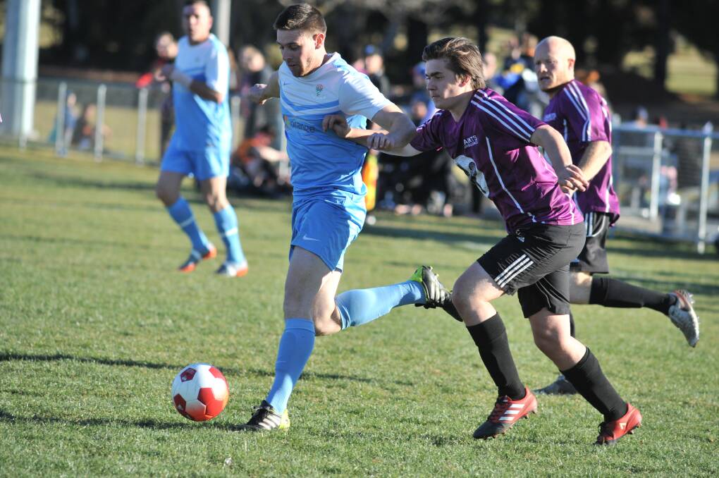 PLAYER SHORTAGES: Waratah FC had a big win, but will be counting on players returning from injury and other commitments to boost their finals hopes. This photo was from a game earlier this year. Photo: JUDE KEOGH