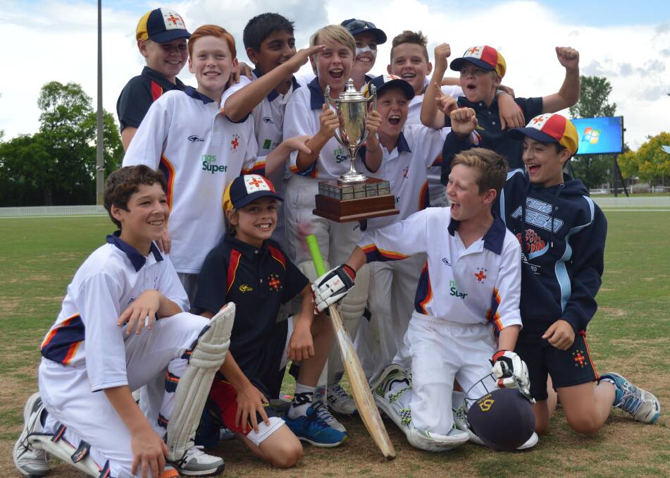 LONG TIME BETWEEN DRINKS: Combined Independent Schools celebrates its first NSWPSSA win since 2002 at Wade Park on Thursday. Photo: MATT FINDLAY