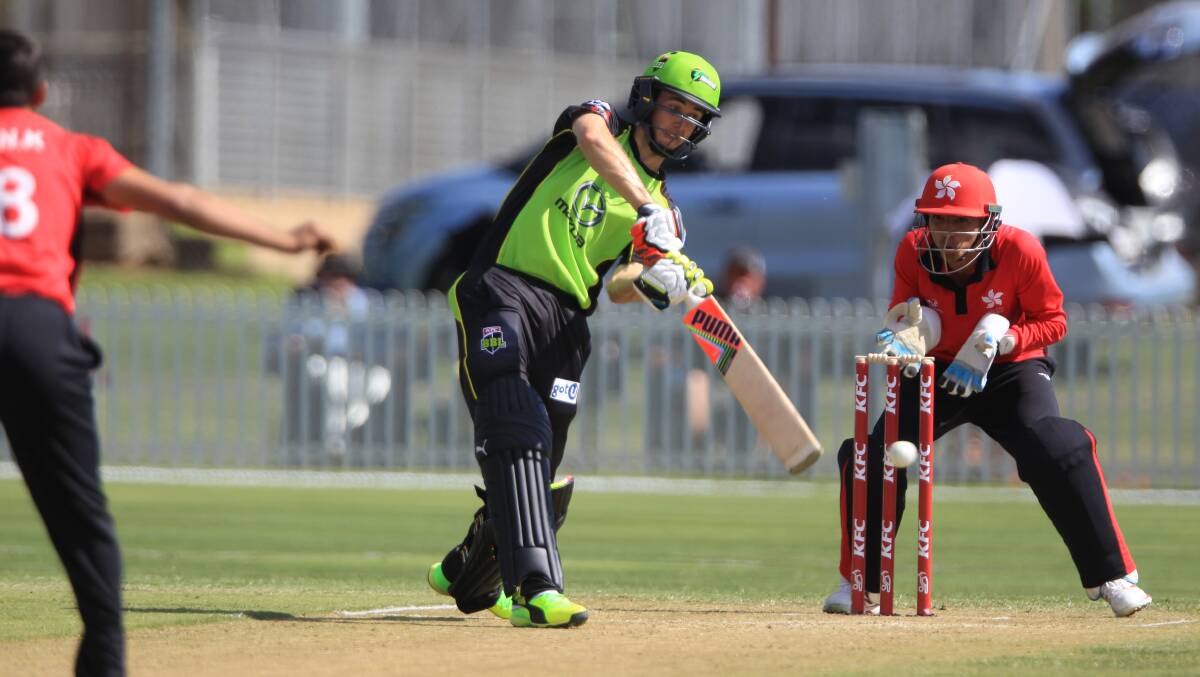 OPENING UP: Kurtis Patterson slashes at one in the opening handful of overs during Sunday's main game. Photo: PHIL BLATCH