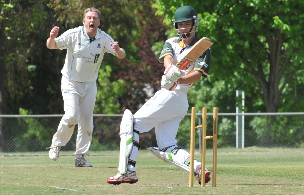 CLEAN BOWLED: Mick Evans roars in celebration after bowling CYMS' Tom West. He took 3-19, but the Warriors were smashed. Photo: JUDE KEOGH
