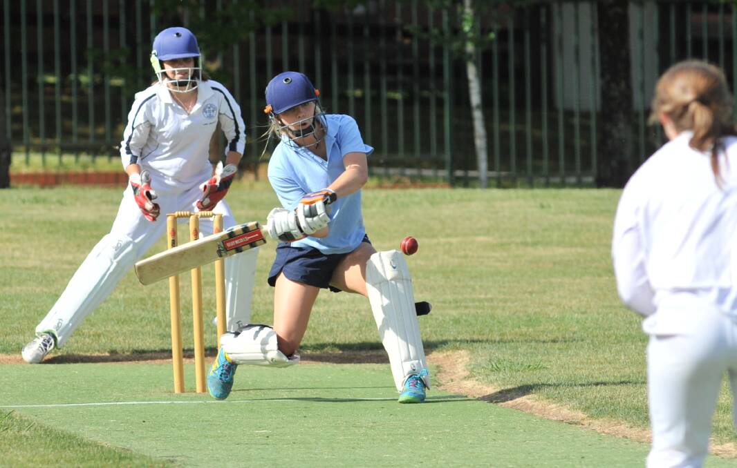 GREAT MOVE: Kinross' Steph Lennon hits out during last year's under 17s Sydney Thunder Girls' League. The ODJCA's new primary schools grant is designed to help increase participation in competitions like this one. Photo: JUDE KEOGH