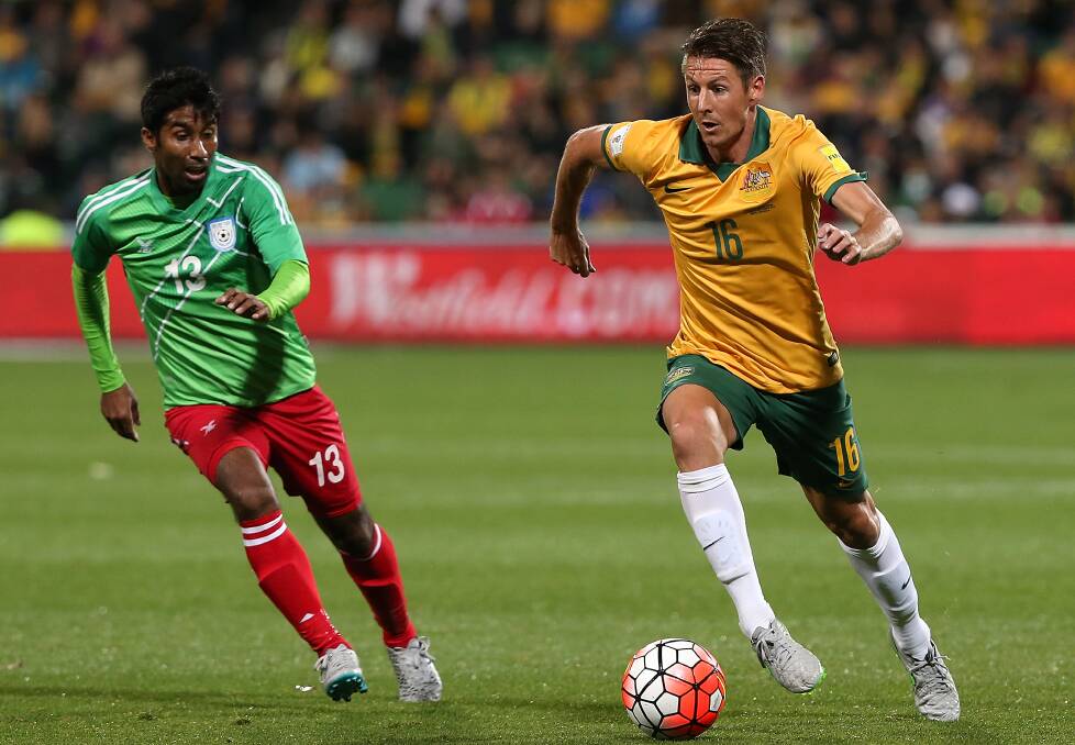 BURNSING DOWN THE HOUSE: Nathan Burns' inside knowledge of Japan's defensive players will help the Socceroos come October. Photo: GETTY IMAGES