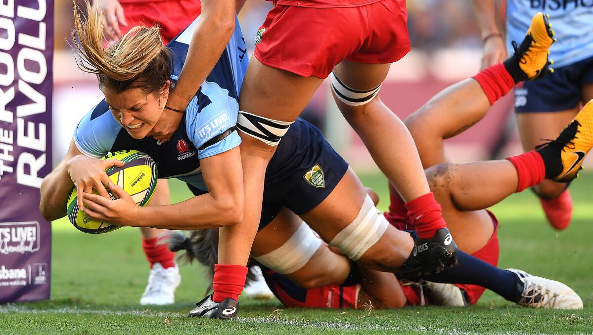 THE LEADING LADY: Kinross product Grace Hamilton scores against Queensland on day one of the Brisbane Global Rugby Tens. She's one of several Wallaroos named in NSW's inaugural Super W squad. Photo: AAP/DAVE HUNT
