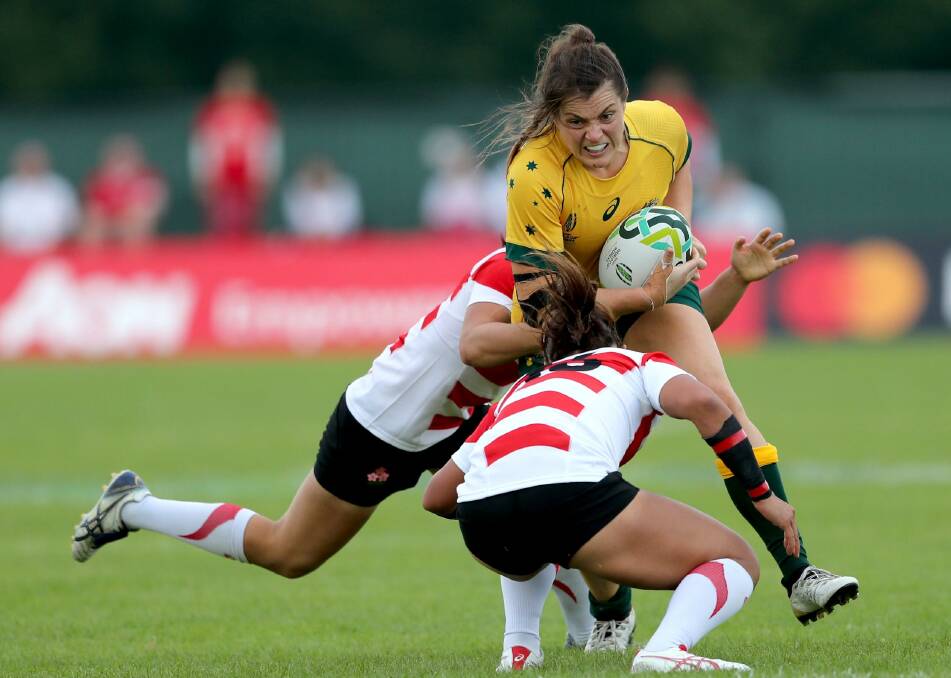 THE INSPIRATION: Kinross product Grace Hamilton charges into the Japanese defence on her way to a player of the game showing. Photo: INPHO/JAMES CROMBIE