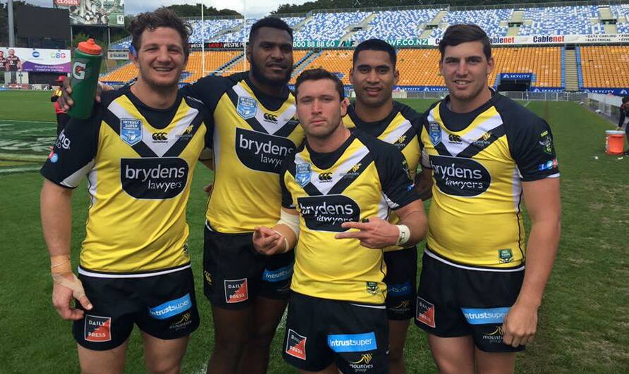 THRILLING FINAL: Former Orange Hawks Alofi Mataele (second from right) celebrates with Mounties teammates earlier this season, the side went down to Illawarra in Sunday's final. Photo: MOUNTIES