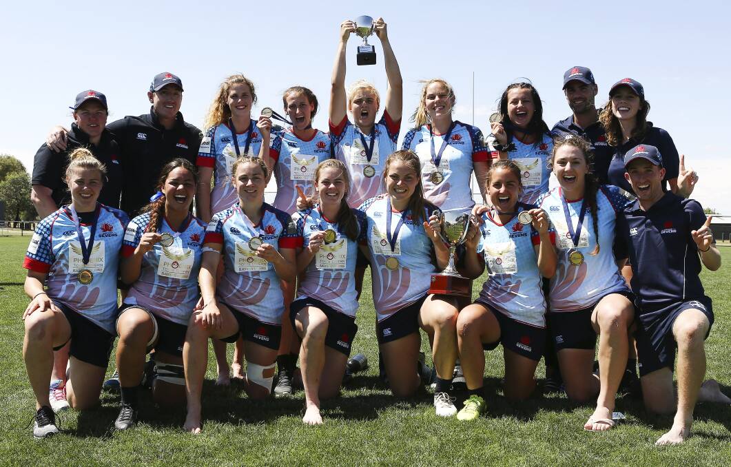 CHAMPIONS: Grace Hamilton, fourth from right in front row, celebrates NSW's national championship win. Photo: KAREN WATSON