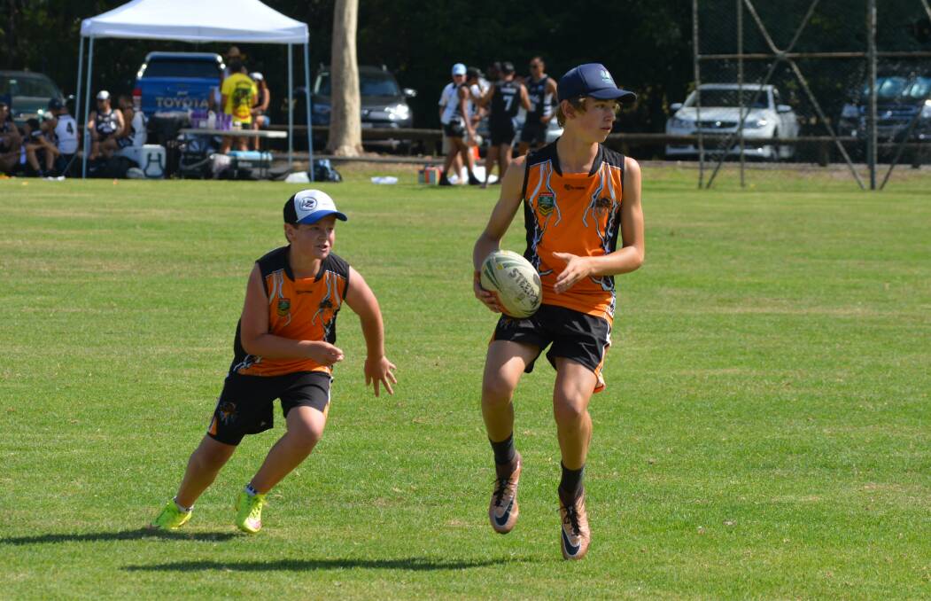 STAR SHOWING: Orange's Jack Cole looks for some support in his under-14 boys' side's opening day. His Thunder side started with a draw and a loss on Friday afternoon. Photo: COTA