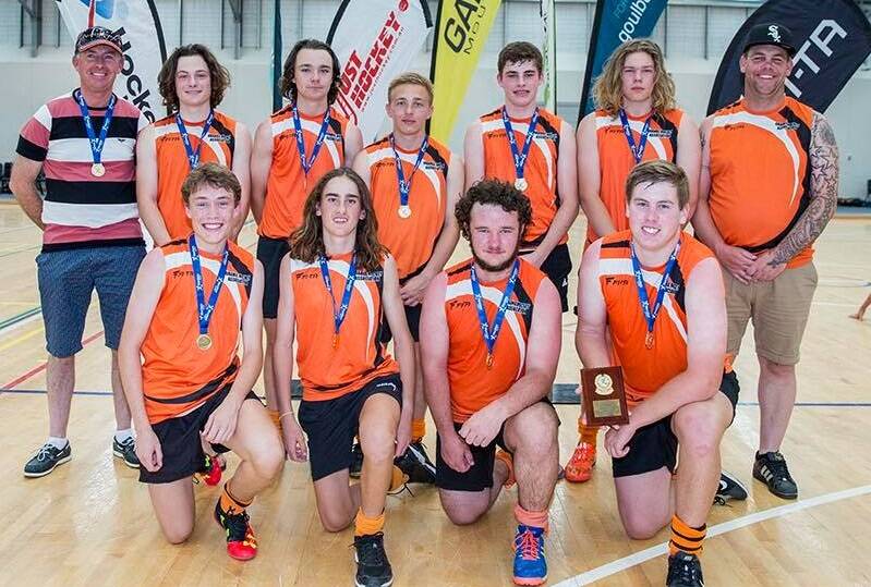 THE CHAMPIONS: Orange celebrates its division two under 18s state title last weekend, it went through undefeated to win. Photo: SUPPLIED