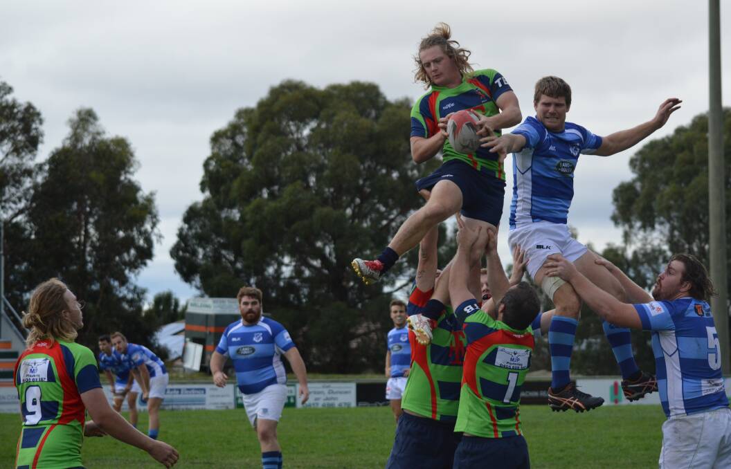 FLYING HIGH: Ben Swadling wins a line-out in Jack Blunt Legends' semi-final victory over Wanderers last year, the side will be among the early favourites in 2018. Photo: MATT FINDLAY