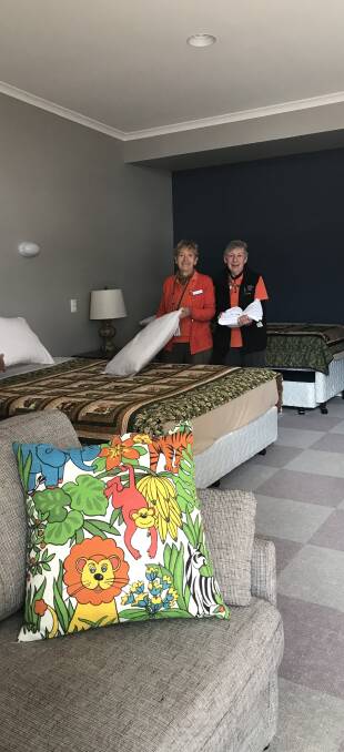 BEHIND THE SCENES: Carol Tilston and Margarite Bowers ready a room for another guest family at Ronald McDonald House Orange. Volunteers like these ladies provide invaluable assistance and are the 'heart of the house'.