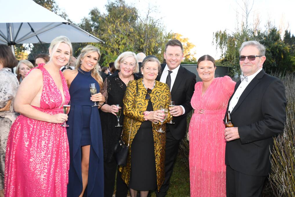 EXTRAORDINARY SUPPORT: Ainslie Hill, Megan Bennett, Margie Whitrow, Sue O'Hare, Ben Fordham, Caddie O'Hare and Bill O'Hare at the ball. Photo: JUDE KEOGH.