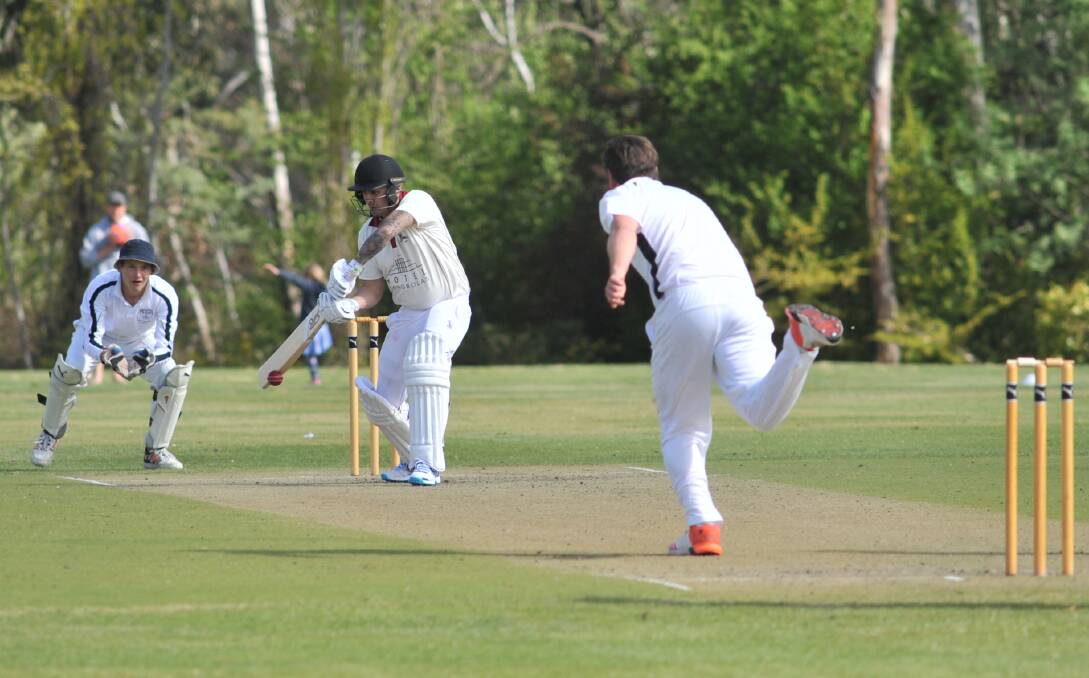 NICE SHOT: Luca Wynn sends down a delivery on the way to a huge 97-run win over the reigning champions Cavaliers at Country Club Oval yesterday. Photo: JUDE KEOGH 1014jkcavkws5