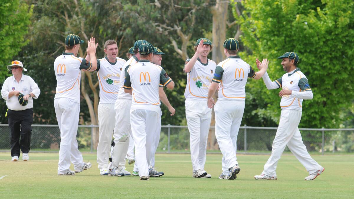 READY TO RUMBLE: CYMS captain Hamish Finlayson (centre) is hoping for more wicket celebrations on Saturday. Photo: JUDE KEOGH