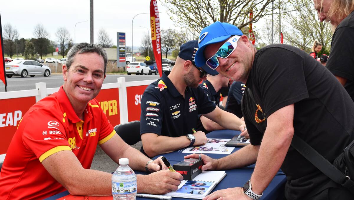 Race fans meet drivers, get autographs