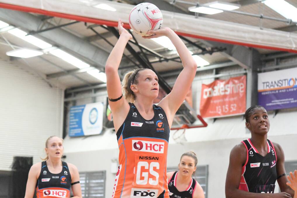 GOOD START: Jo Harten played a starring role for Giants Netball. Photo: JUDE KEOGH.