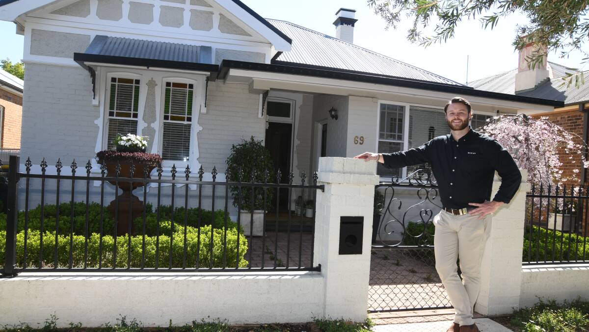 Jack Aumuller outside 69 Clinton Street which was one of nine houses sold between September 2022 and 2023 which fetched a multi-million sale price. Picture by Jude Keogh