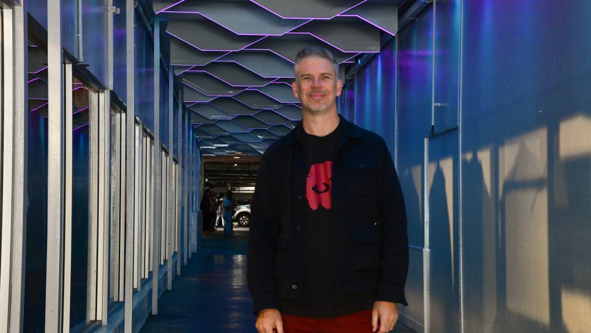 Daniel Templeman at the laneway connecting the Central Square Shopping Centre car park to Summer Street which he re-designed. Picture by Carla Freedman