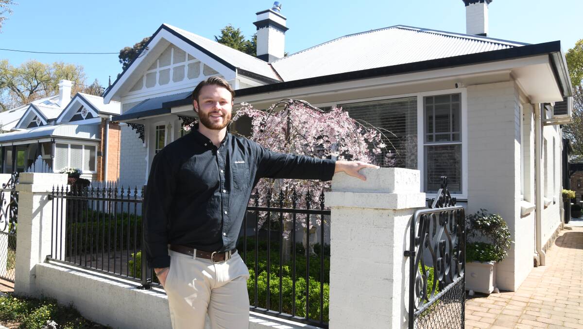 Jack Aumuller outside 69 Clinton Street which was one of nine houses sold between September 2022 and 2023 which fetched a multi-million sale price. Picture by Jude Keogh