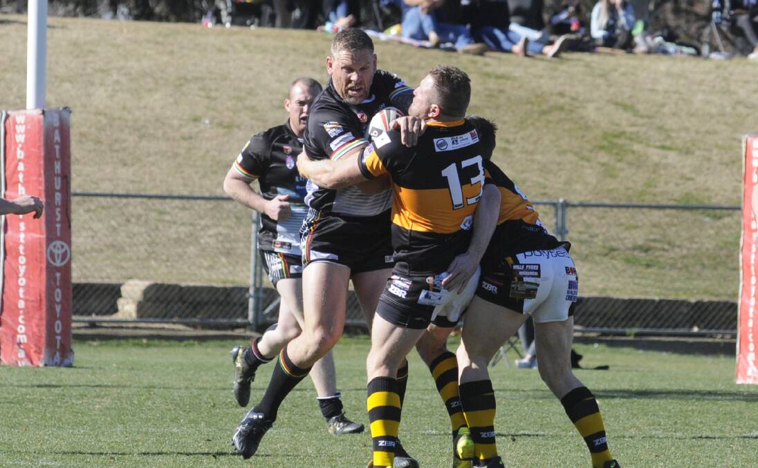 ANOTHER SHOT: Bathurst Panthers' Simon Osborne takes a hit up during the qualifying final loss to Oberon Tigers. Photo: CHRIS SEABROOK