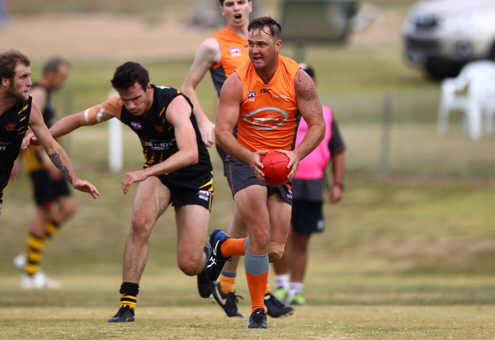 GIANT CONTRIBUTION: Bathurst Giants' Paul Jenkins kicked six goals in his team's triumph over the Cowra Blues on Saturday. The Giants kicked nine goals in a dominant third term. Photo: PHIL BLATCH