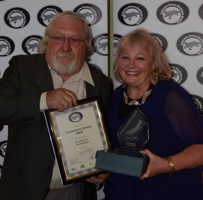 Regions best: Councillor Geoff Dean and Susie Crosbie receive their award at last year's Daroo Business Awards.