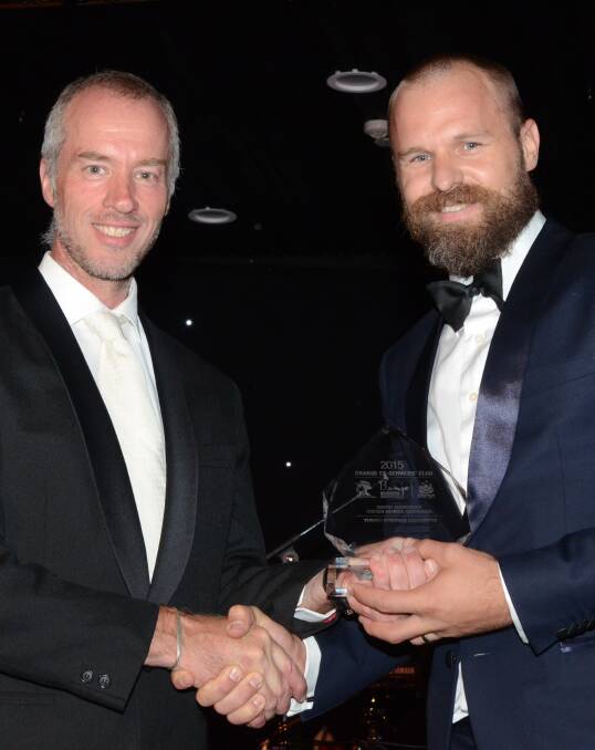 Best in business: Chamber President Mark Madigan presents David Berryman with the Young Business Executive award at last year's Banjo Business Awards.