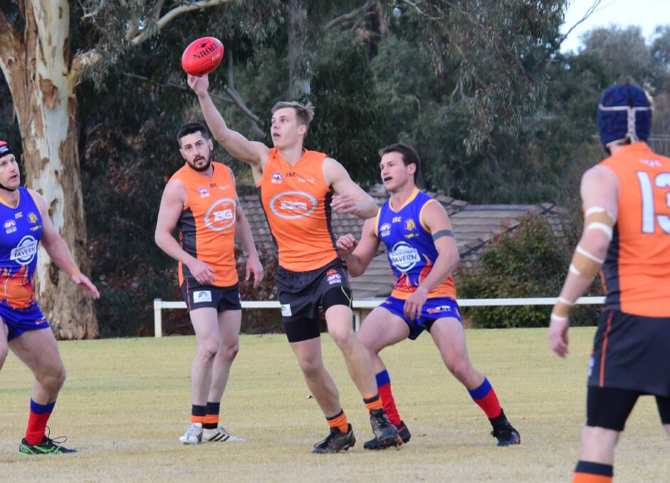 HUSTLE: Ben Patterson (right), pressuring the Bathurst Giants earlier this season, returns to the Dubbo Demons lineup for this weekend's match. Photo: PAIGE WILLIAMS